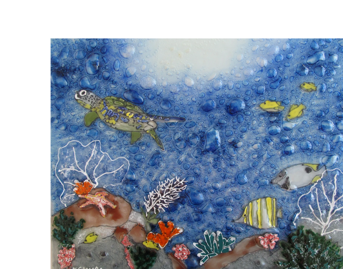 Underwater scene painted on glass.  Coral, Fish, Sea Turtle.  Lots of bubbles in the water.  
