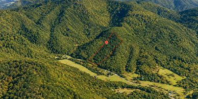 Aerial of wooded foothills near Taylorsville, 9 acres for sale in Alexander County NC