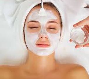 Applying mask during a facial service 