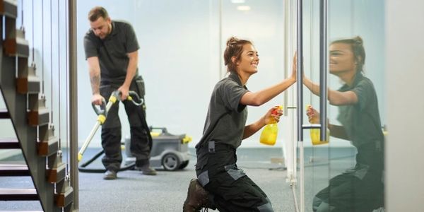 day porter cleaning windows