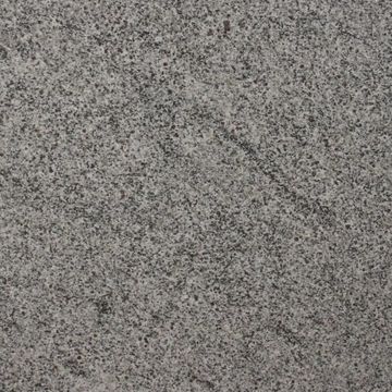 This granite has a white background tone with constant variations grey and black flecks throughout