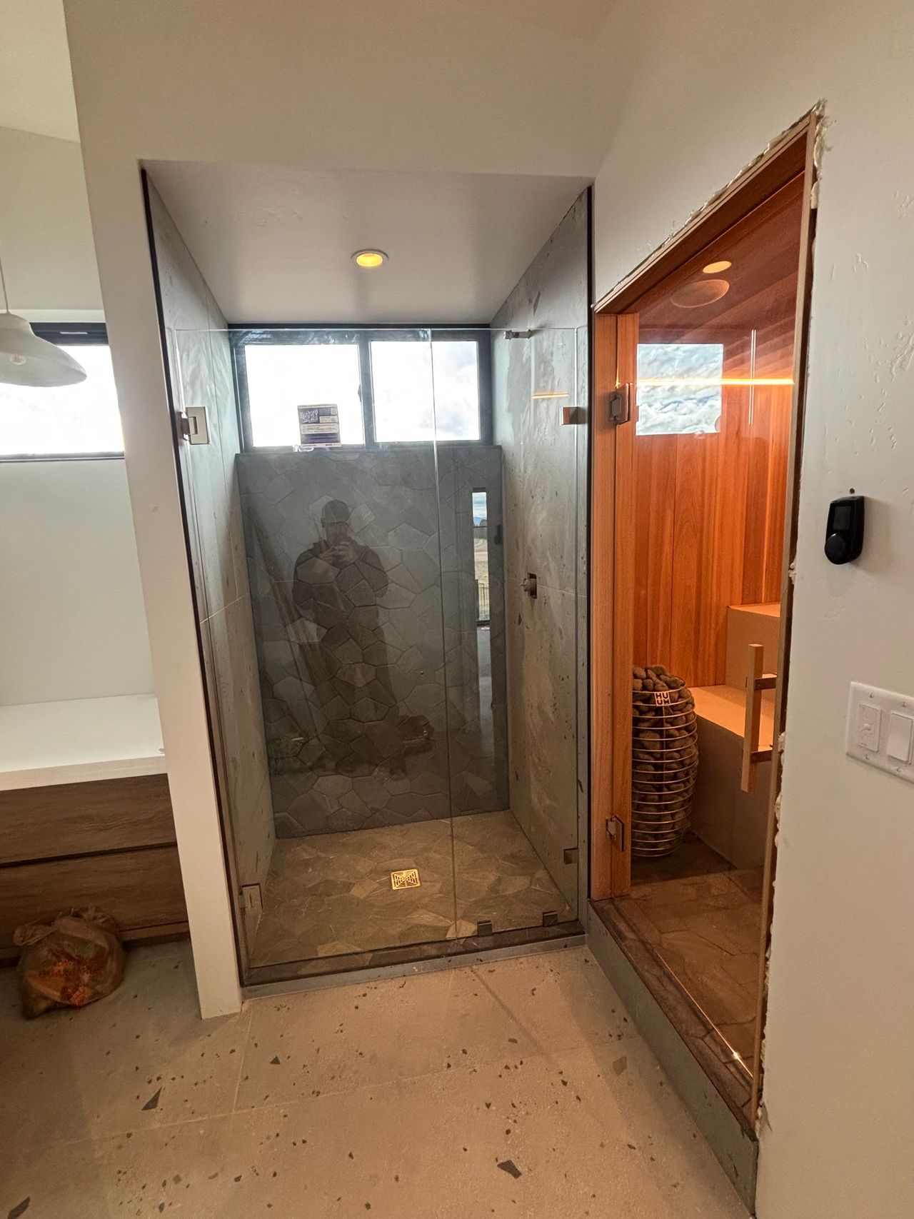 Custom shower that Brett, the lead shower technician for Precision Glass, installed