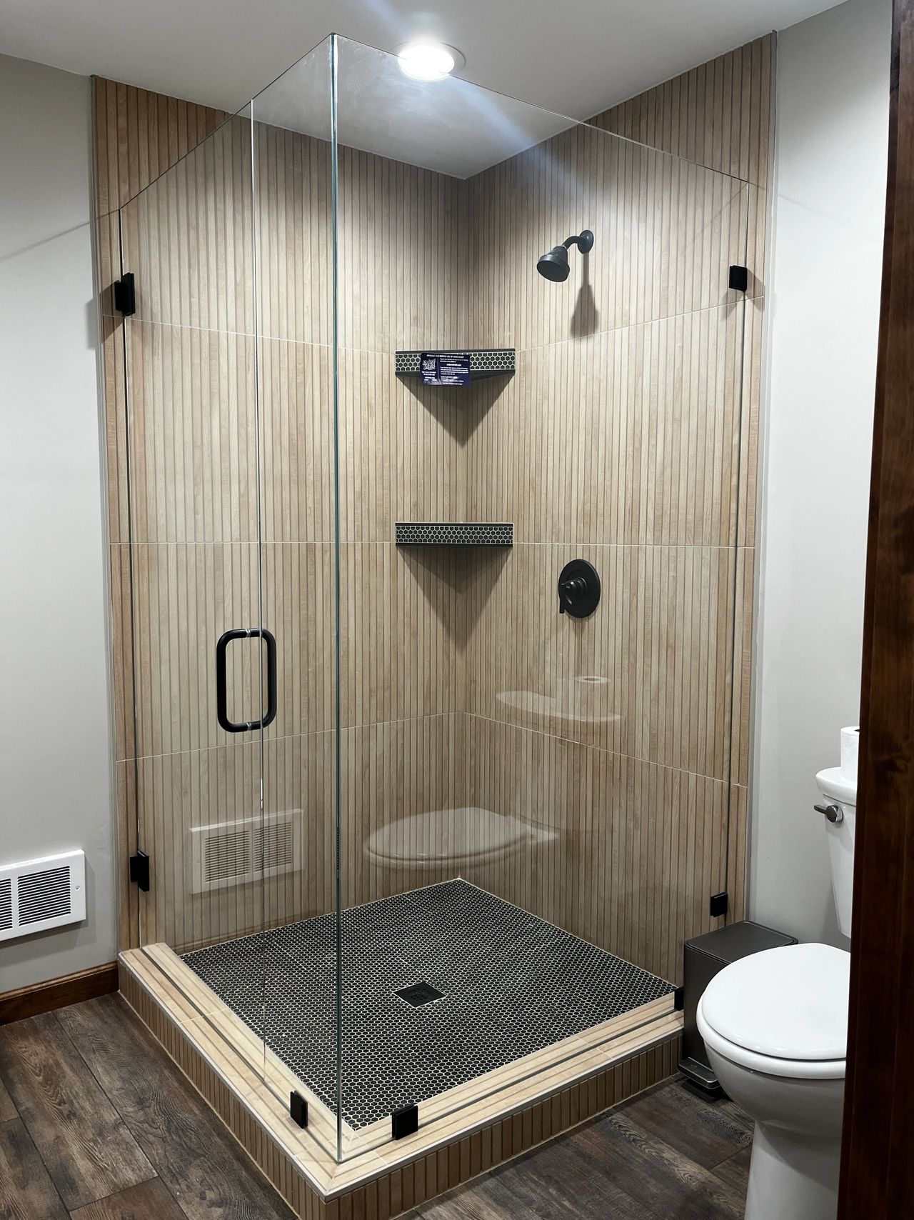 Modern shower in a rustic getaway cabin for a Precision Glass customer in Bigfork Montana