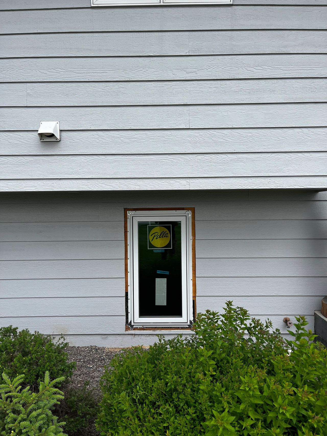 White Pella Impervia replacement casement style window