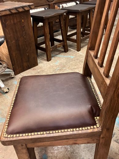 Leather upholstered mesquite chair, re upholstery services by NBTXrestoration