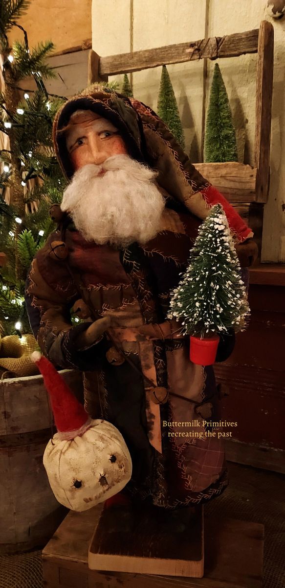 5) Santa in Crazy Quilt Holding Snowman Head