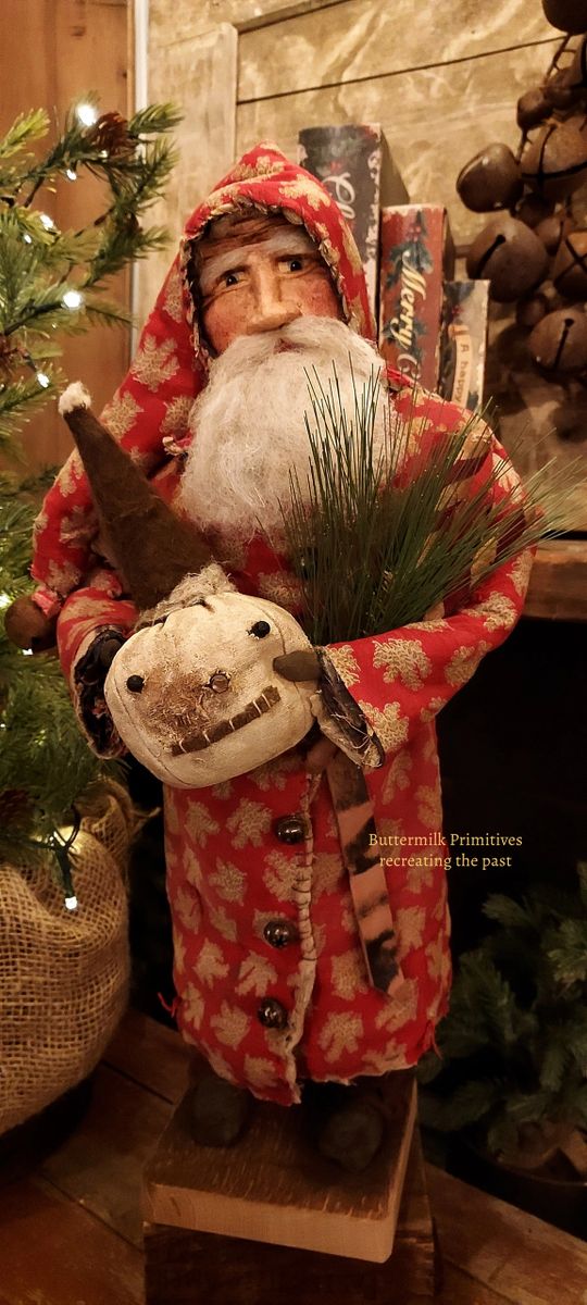 4) Santa in Late 1800's Early 1900's Red Quilt Holding Snowman Head