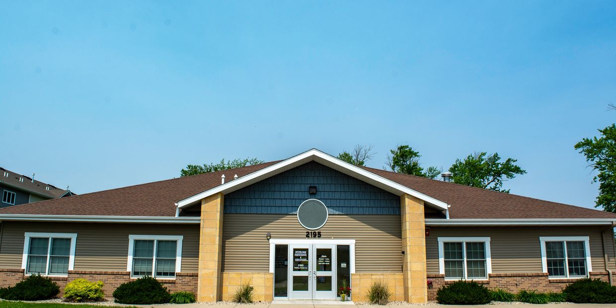Exterior of a single-story preschool building with clear skies. Located in North Mankato, MN.