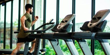 man running on treadmill