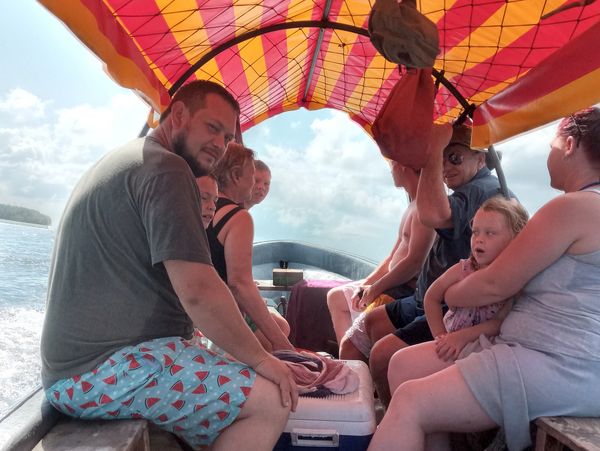 Family on the boat heading to Mnemba island