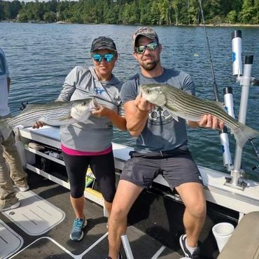 A picture of a man and a woman who went on a fishing