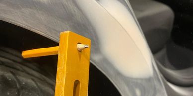 Car bodyline tool with pencil tip for auto repair.