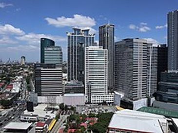 Modern city skyline with tall buildings.