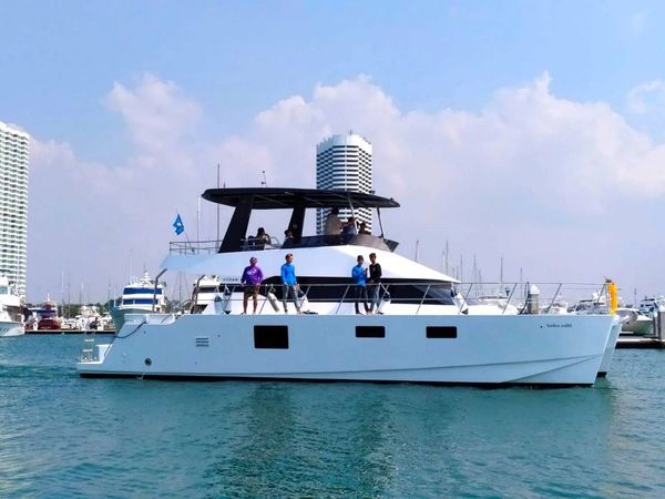 Bonbon Private Yacht Langkawi Charter Departing the Dock for a Sunset Langkawi Cruise