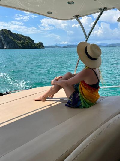 Lady Enjoying a Private Langkawi Cruise, Part of an Amazing  Private Yacht Cruise Langkawi Package