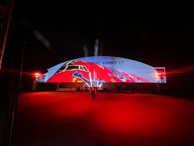 Projection mapping by Northern Lights NT lights up the Old Qantas Hangar, Darwin, celebrating 100 ye