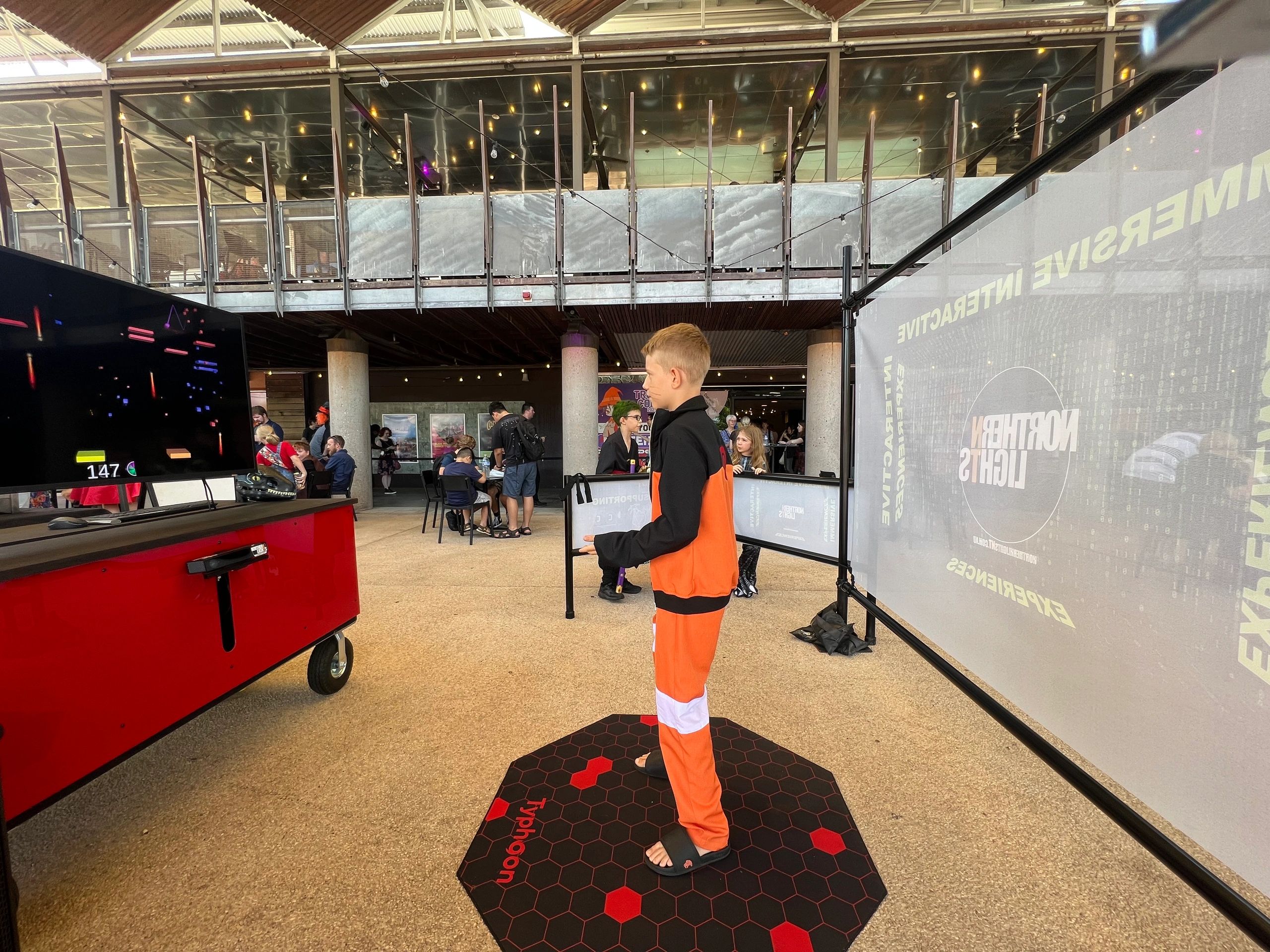 In the interactive stance . Northern Lights NT interactive gaming installation  at Tropicon 2023