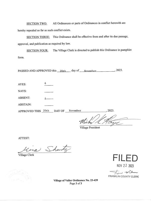 Official document showing ordinance approval and signatures from village officials.