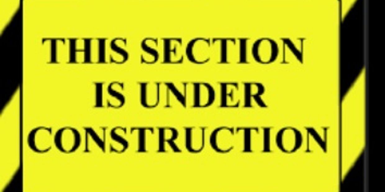 Bright yellow sign stating section under construction with black stripes.