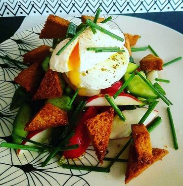 POACHED SWISS FREERANGE EGG ON FORMAGGINO AND RADISH-CUCUMBERSALAD,
CHIVES,CROUTONS