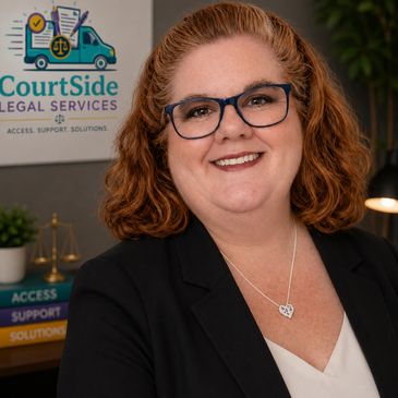 Professional woman smiling in office with CourtSide Legal Services sign.