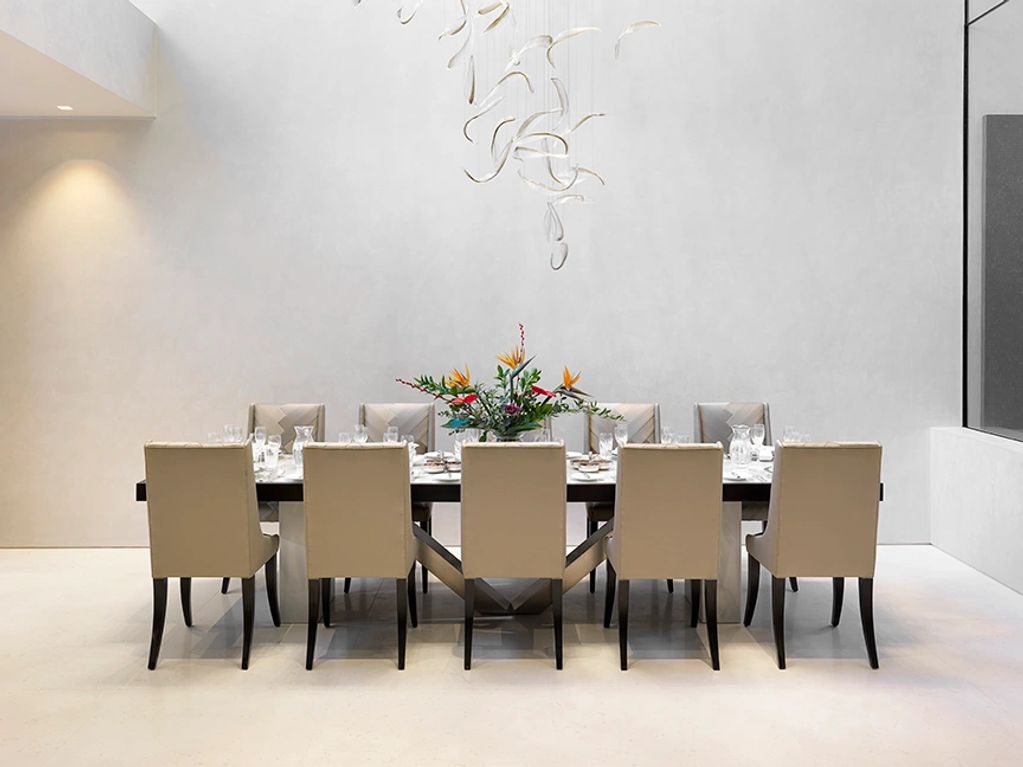 Smooth marmorino walls in glass filled double height dining hall London