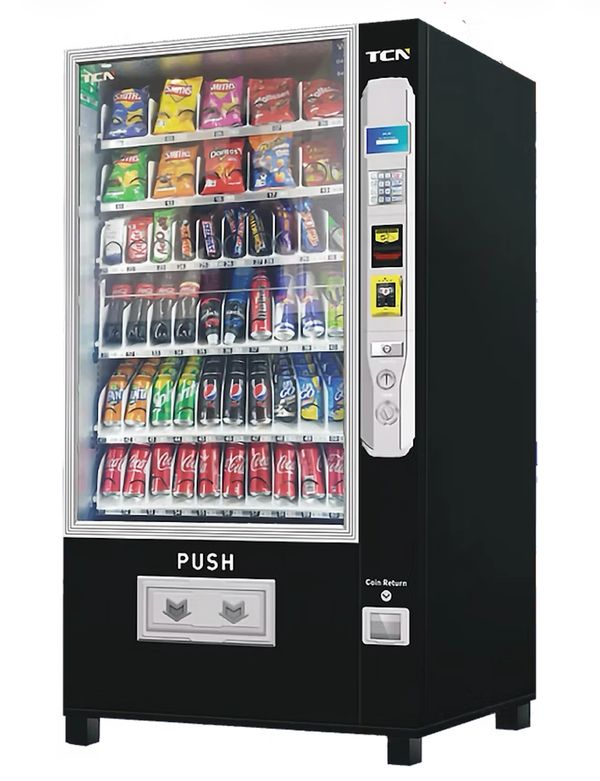 A vending machine stocked with snacks and beverages, including chips and soda cans.