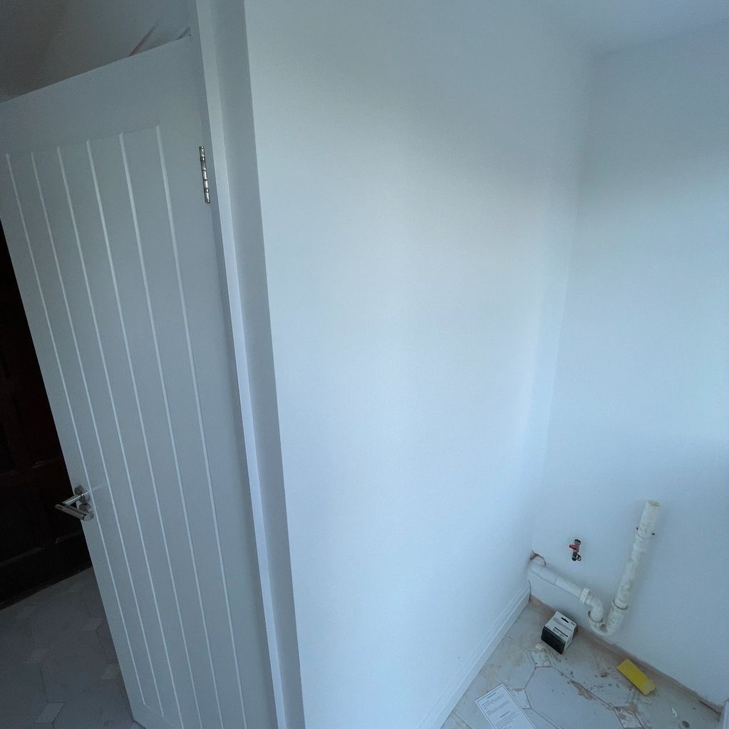 New cold water and waste feeds for a washing machine as part of the utility room conversion