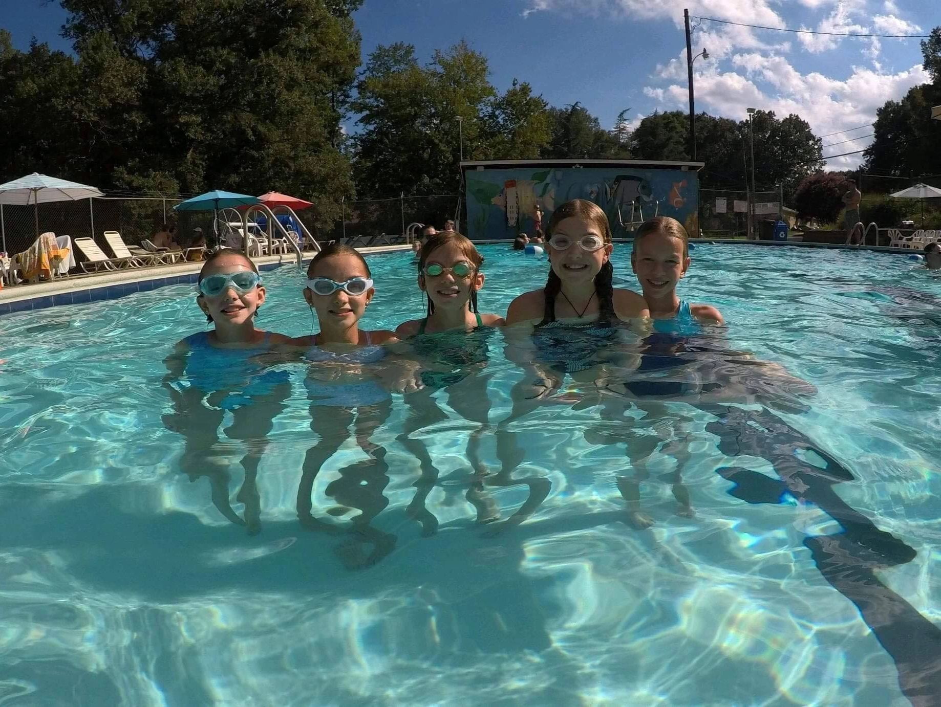 Kids swimming in a pool