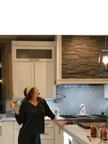Woman enjoying a new kitchen
