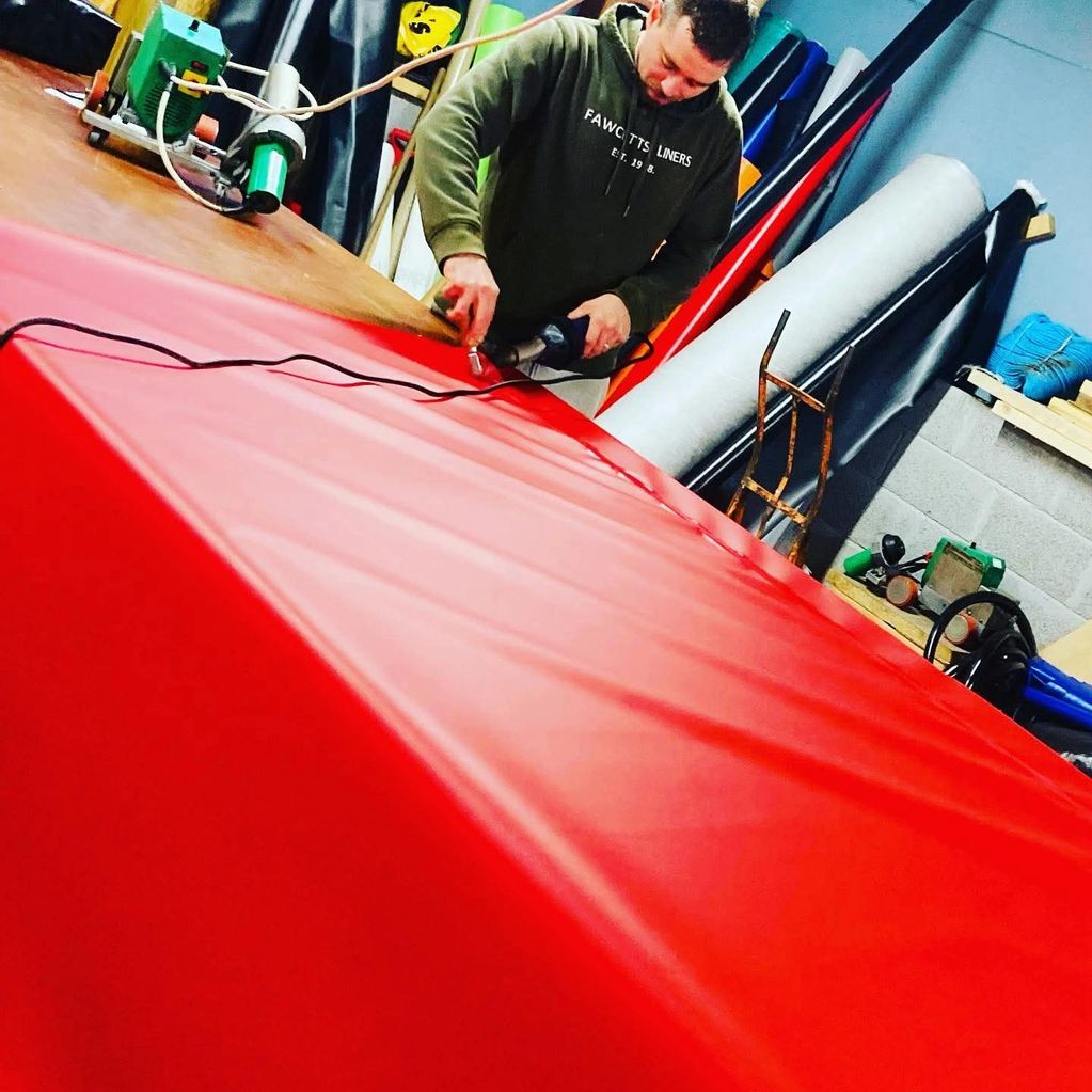 Red material being welded 