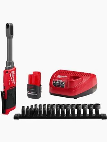 Milwaukee cordless ratchet wrench set with battery, charger, and socket collection.