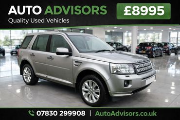 Silver Land Rover SUV displayed in a showroom for £8995 sale.