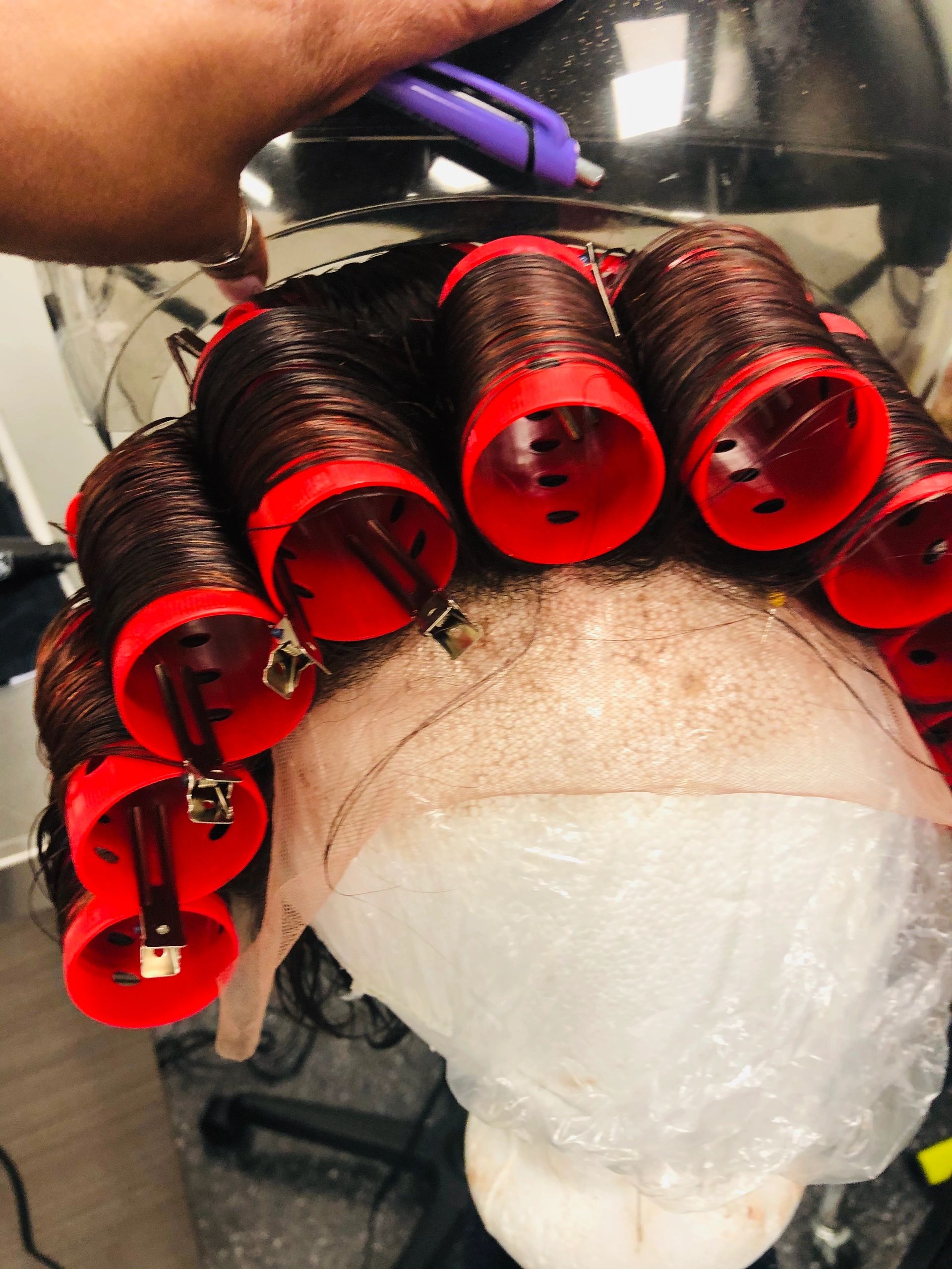 Shampoo, conditioned, cut, roller set and style. Ready for client to pick up.
