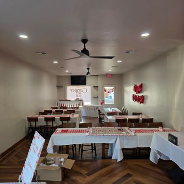 Empty room with tables set for a party or event.