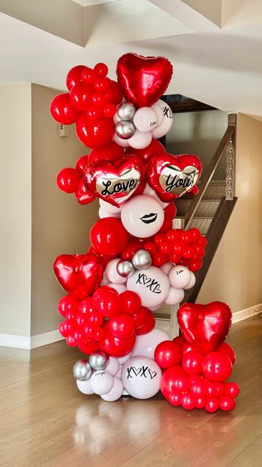 Tall, eye-catching Valentine balloon column—full, gorgeous, and perfect for celebrations.
