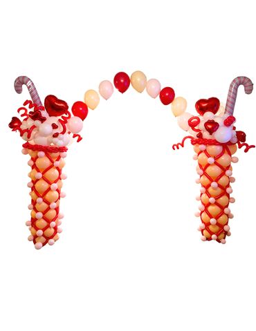Helium balloon arch connects two balloon milkshakes—perfect for sweet, memorable photo moments.
