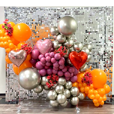 Heart balloon garland on a shimmering sequin wall; moving sequins create a magical atmosphere.