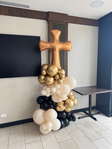 Organic balloon column with large gold foil  cross-shaped topper