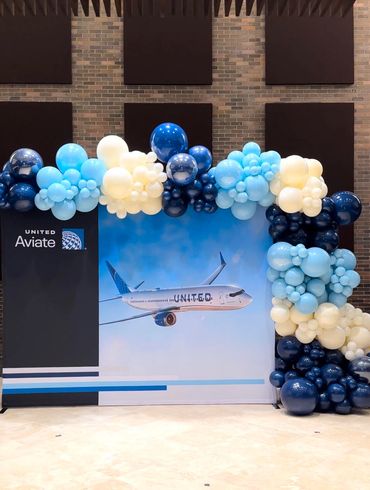 Balloon garland installed on the Aviate company's own backdrop.