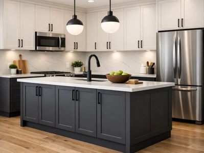 Modern kitchen with dark island and white cabinets.
