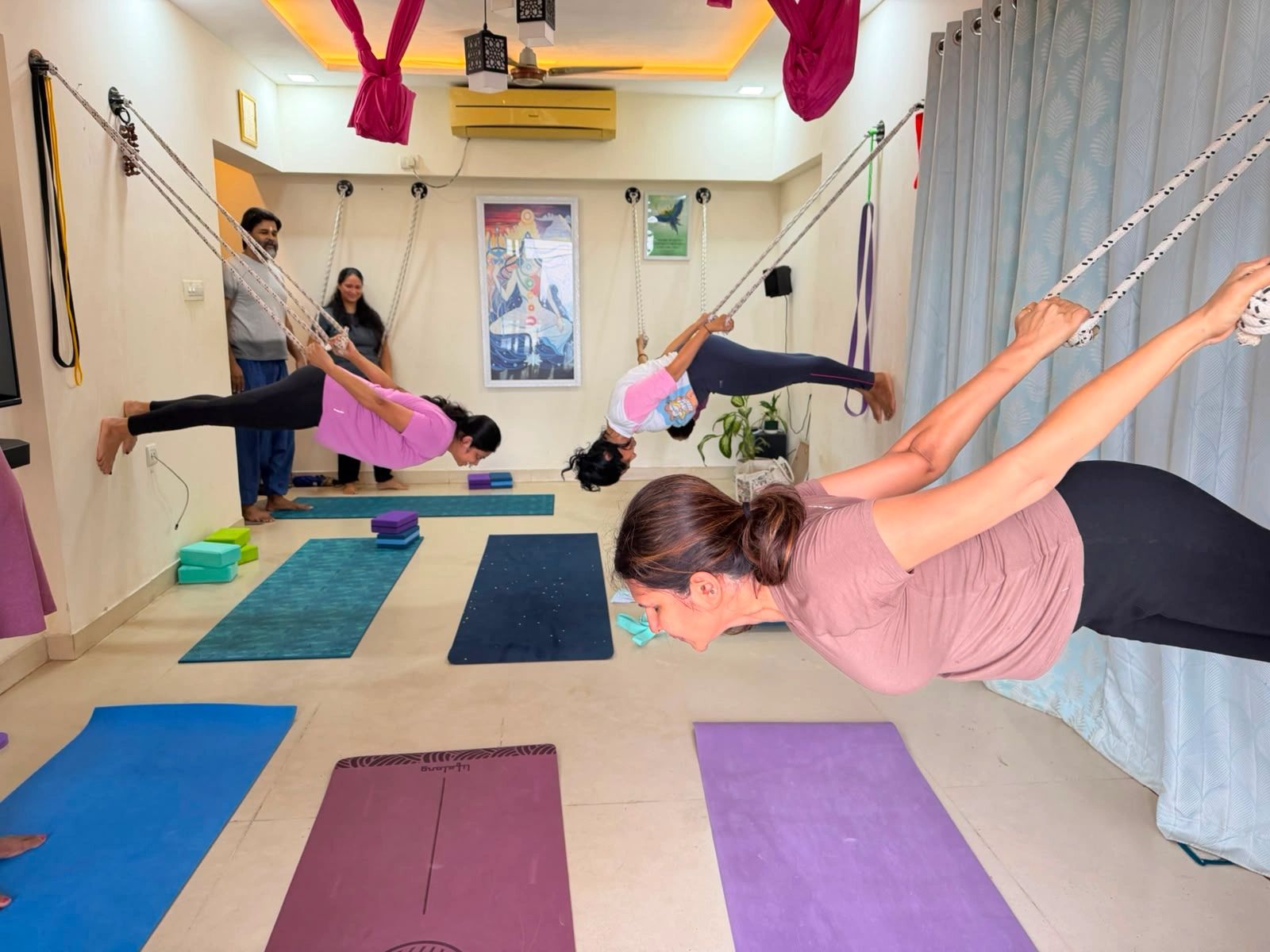 People practicing Iyengar Yoga