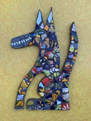 Handmade whimsical dog mosaic. 