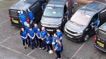 777 Plumber drone photo of team
