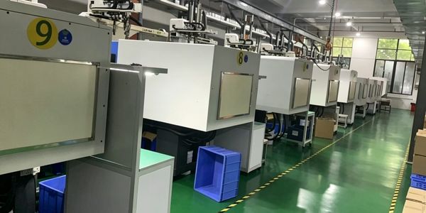 Row of machines in a clean factory setting.