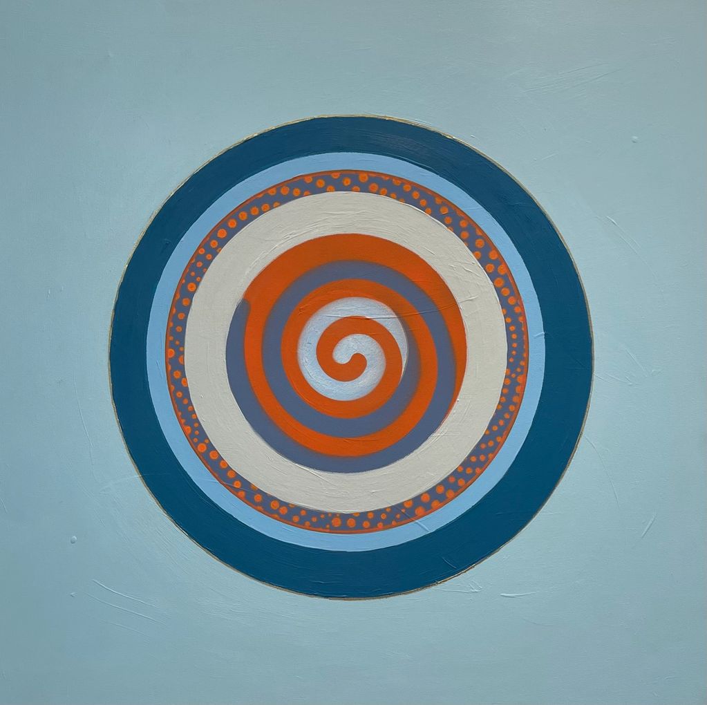Concentric circles and spirals in blue, orange, and white on a light blue background.