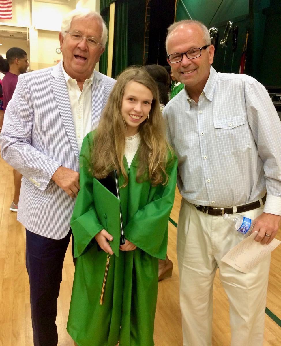Robert Russell (right) and his father Archie (left) at his daughter's middle school graduation. Robert's father stayed at a hotel with him during his daily chemotherapy and radiation treatments, and returned to stay at Caring House with him during a month of hyperbaric oxygen treatments. Robert Russell (right) and his father Archie (left) at his daughter's middle school graduation. Robert's father stayed at a hotel with him during his daily chemotherapy and radiation treatments, and returned to stay at Caring House with him during a month of hyperbaric oxygen treatments.