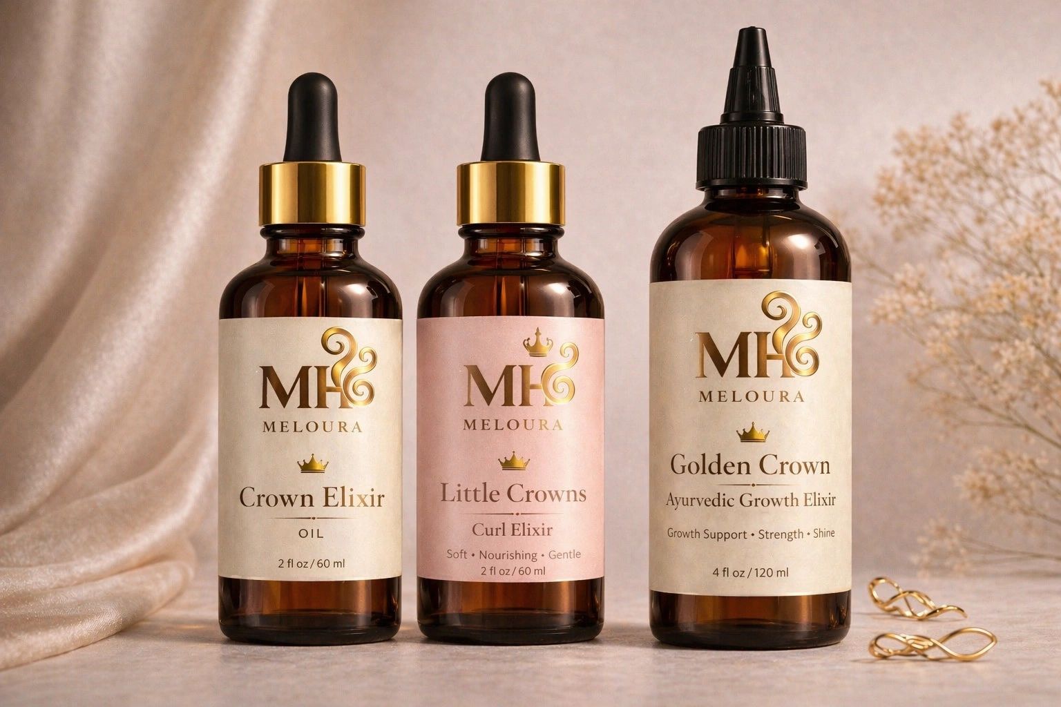 All 3 of Meloura Hair oils side by side in amber dropper bottles behind the brand tag line.