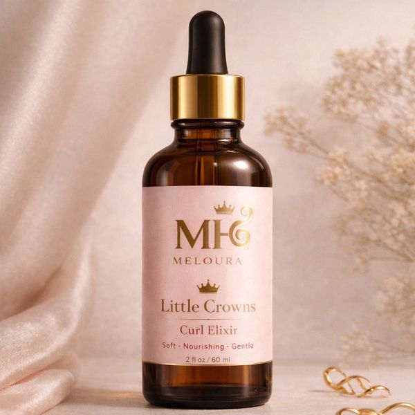 Meloura Little Crowns Curl Elixir in an amber dropper bottle. 
