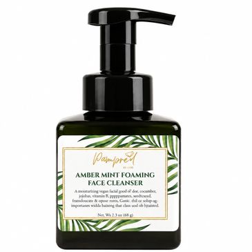 Amber Mint Foaming Face Cleanser in a black pump bottle with botanical label design.
